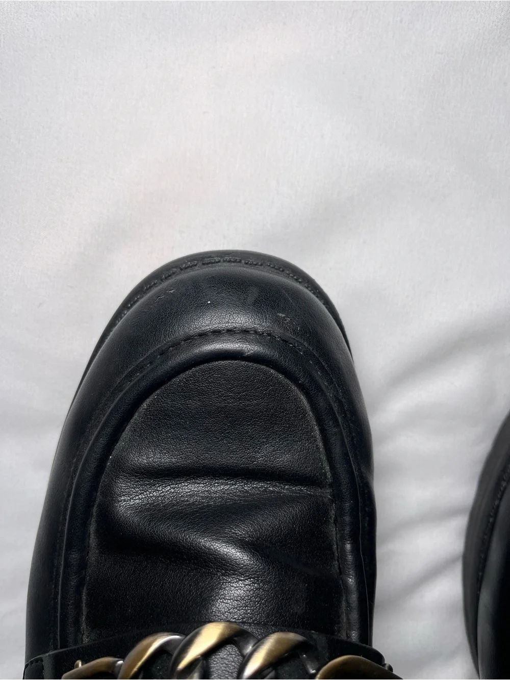 Black Leather Loafers with Gold Chain Accent